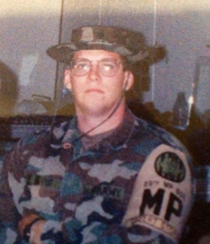 A young Michael Hovis in his Army military police uniform during the Gulf War era